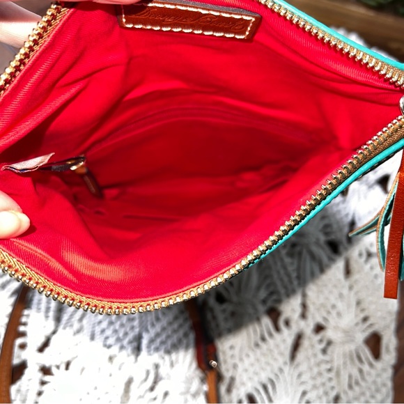 Dooney & Bourke | Pebbled Grain Fold Over Zip Crossbody - Picture 9 of 10